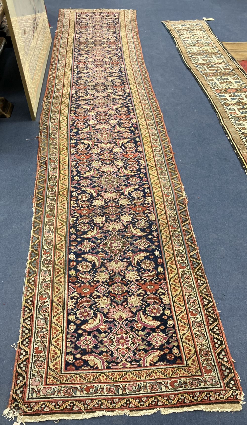 A Feraghan blue ground runner, 478 x 86cm